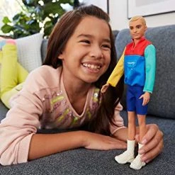 Mattel Barbie Ken Fashionistas Doll #163, Slender With Sculpted Blonde Hair Wearing Color-Blocked Jacket-Style Top, Blue Shorts & White Boots, Toy For Kids 3 To 8 Years Old